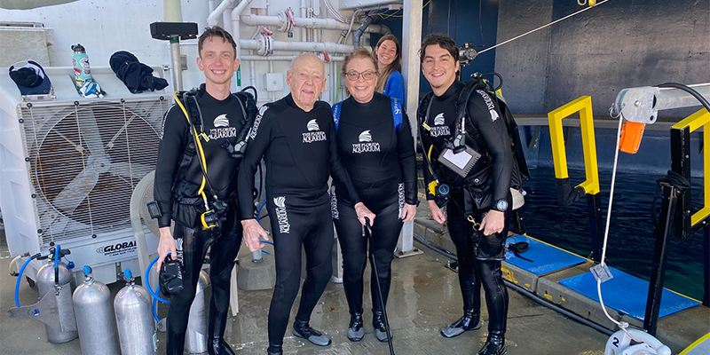 Fred Johnson, Patty Sorensen and others in wetsuits