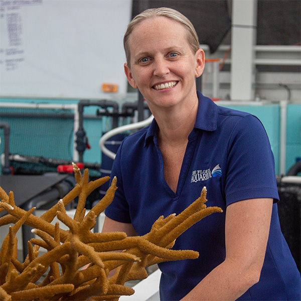 Keri O'Neil holding staghorn coral
